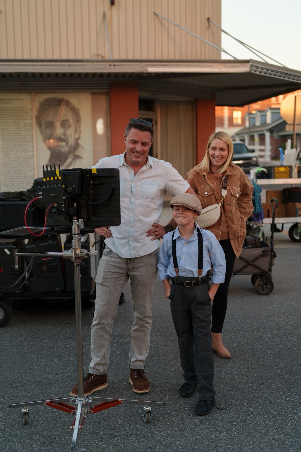 Jonathan Coussens on set with his wife and son.