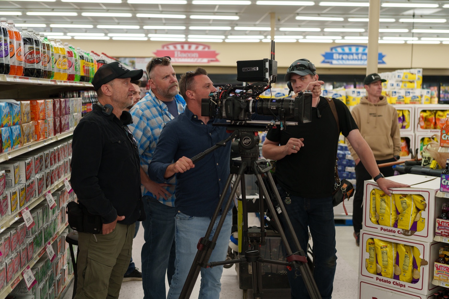 Jonathan Coussens at camera with the crew.